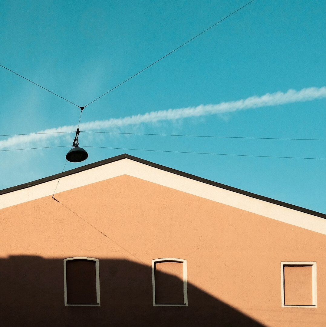 drone flying over house